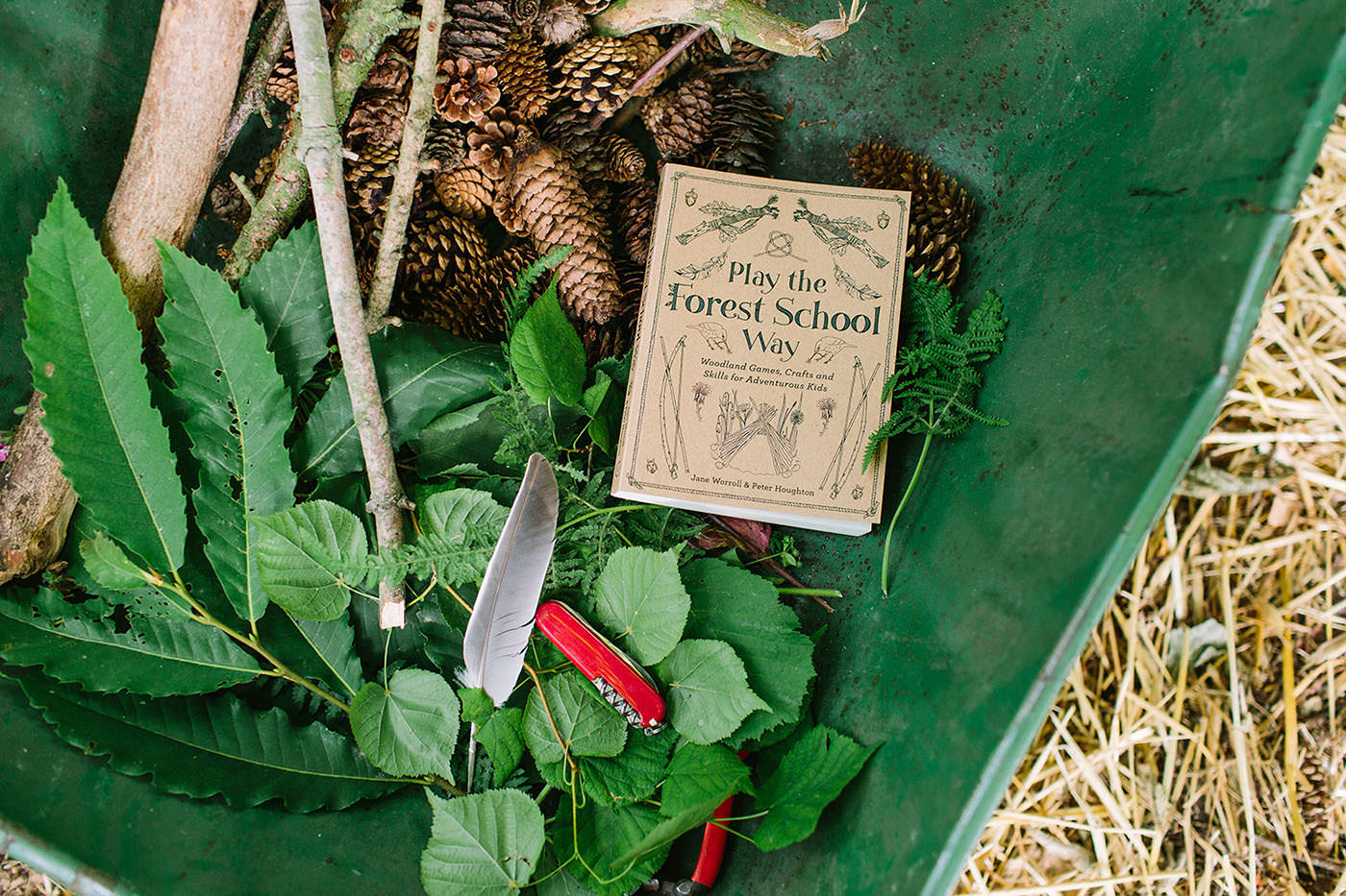 a variety of object in a wheelbarrow