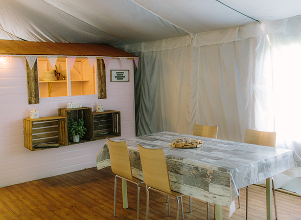 Nice table and chairs inside a tent