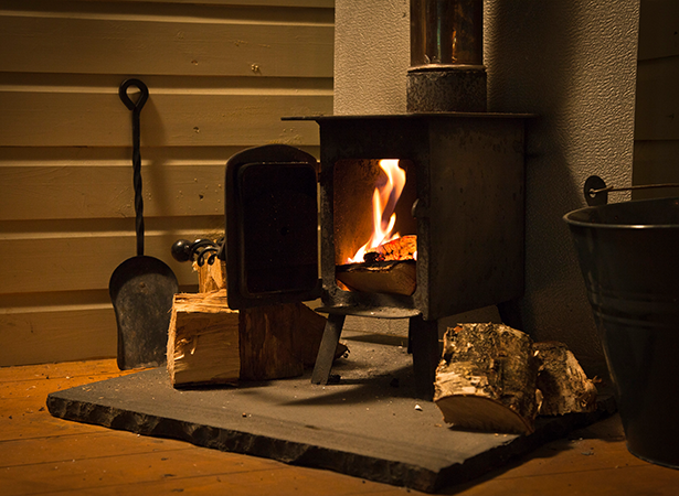 Roaring open fire inside a tent